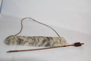 lot 98 image: Handcrafted Arrow with Stone Tip and Fur Quiver
