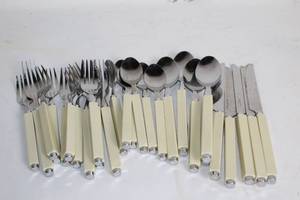 lot 121 image: Set of 24 Ivory Handled Stainless Steel Cutlery
