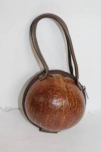 lot 133 image: Round Coconut Shell Handbag with Floral Lining