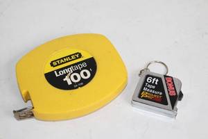 lot 142 image: Stanley Longtape 100ft and Project Pro 6ft Tape Measures
