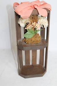 lot 160 image: Wooden Display Stand with Artificial Flowers and Pink Bow