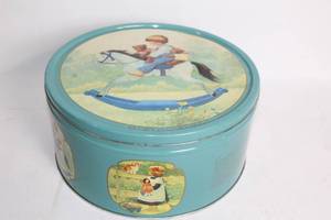 lot 262 image: Round Metal Tin with Vintage Rocking Horse Design