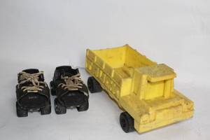 lot 280 image: Vintage Yellow Toy Truck and Zipees Roller Skates