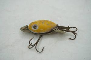 lot 59 image: Vintage Arbogast Hula Dancer Fishing Lure