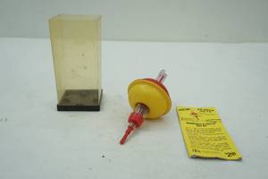 lot 65 image: Vintage Sure-Set bobber in original packaging