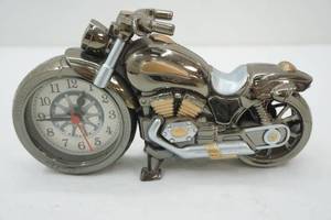 lot 518 image: motorcycle clock-plastic 9x4.5