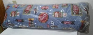 lot 509 image: Coca-Cola, Coke New Body Pillow.