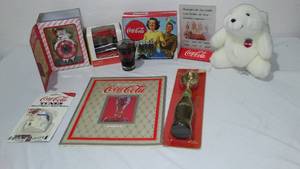 lot 762 image: Coca-Cola, Coke Variety Of Collectible. Bear, Calander, Candle, Ice Cream Scoop And More.