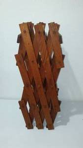 lot 518 image: Wood Accordion Style Bottle Racks.