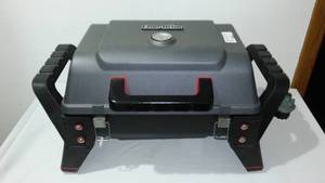 lot 552 image: Char-Broil Tabletop Propane Grill. Great for Small Balconies, Camping, approx. 24 x 16 x 14 in. H