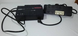 lot 558 image: Surge Protector and Outlet Extender.