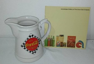 lot 748A image: Coca-Cola, Coke Pitcher With History Book.