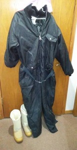 lot 598 image: Sorel Boots and Snow Mobil Suit.