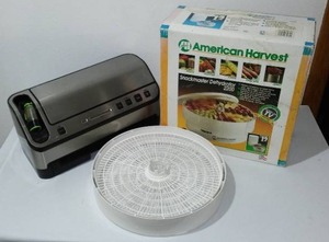 lot 599 image: Food Saver and Dehydrator.