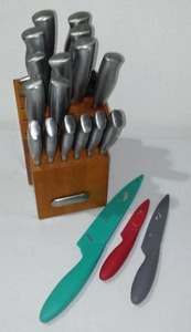 lot 636 image: Farberware Knife Block set plus. Missing the sharpener stone.