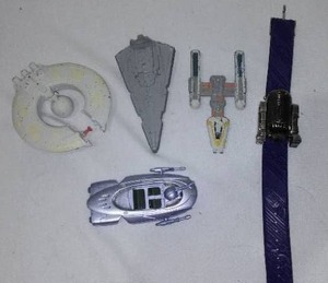lot 787 image: Vintage Star Wars Vehicles (4) And R2D2 Watch.
