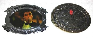 lot 822 image: Pendleton Whiskey and Scar Face Belt Buckles.