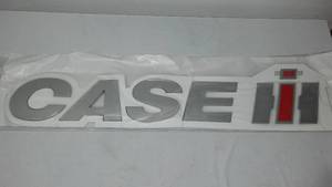 lot 828 image: CASE IH Emblem. 5 in. H x 29 in.