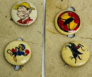 lot 144 image: 1940s Kelloggs Pins including Wilmer Comic Book Character Button Pin, Navy Cruiser Scouting Squadron, Marine Squadron and Bombing Squadron Pin