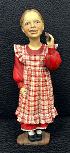 lot 104 image: Adorable Norwegian Girl with a Cookie Figurine