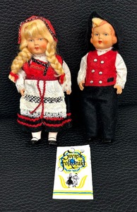 lot 94 image: Allan Flink for Svensk Folkdrkt Dolls
