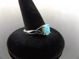 lot 56 image: .925 Sterling Silver Opal Cabochon Celtic Ring Size 8