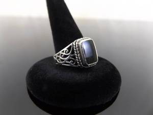 lot 74 image: .925 Sterling Silver Inlayed Black Onyx Ring Size 8