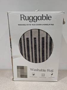 lot 130 image: RUGGABLE 8x10 MACHINE WASHABLE RUG COVER & NONSLIP PAD