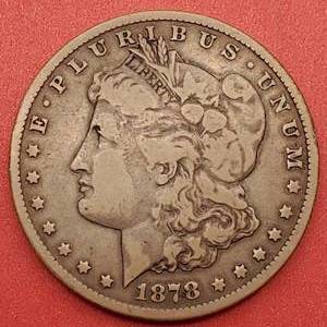lot 12 image: 1878 CC Morgan Silver Dollar