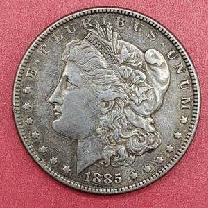lot 13 image: 1885 Morgan Silver Dollar Higher Grade