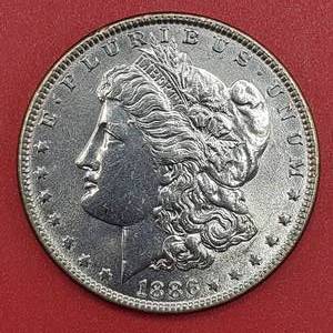 lot 14 image: 1886 Morgan Silver Dollar Higher Grade