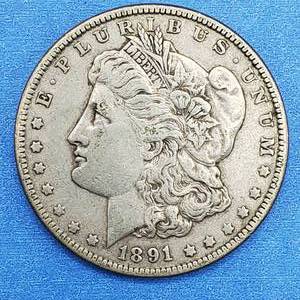 lot 18 image: 1891 Morgan Silver Dollar