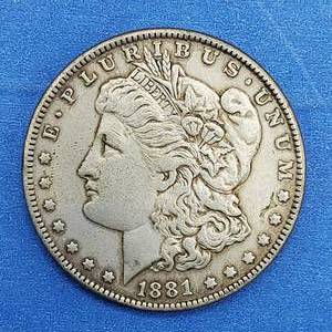 lot 24 image: 1881 Morgan Silver Dollar