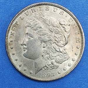 lot 37 image: 1897 Morgan Silver Dollar Higher Grade