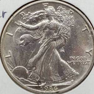 lot 111 image: 1936 Walking Liberty Half Dollar Marked MS63