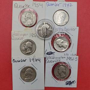 lot 382 image: 7 90% Silver Quarters--6 Washington & 1 Standing Liberty