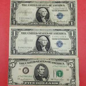 lot 392 image: 2 Silver Certificates & Misprinted 5 Dollar Note
