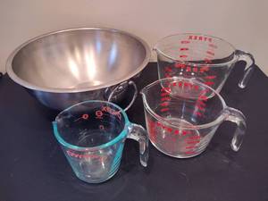 lot 73 image: Stainless Mixing Bowl  Pyrex Glass Measuring Cups