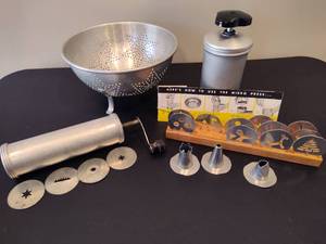 lot 94 image: Vintage Colander & Asst Cookie Presses