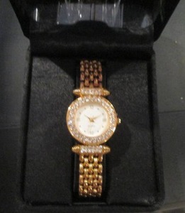 lot 16 image: Elizabeth Taylor white diamonds watch