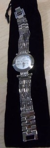 lot 56 image: Burgi Ladies Crystal Diamond Accent and Mother of Pearl Watch