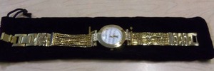 lot 58 image: Burgi Ladies Crystal Diamond Accent and Mother of Pearl Watch