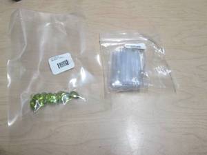 lot 85 image: PERIDOT 25.00CTW MIXED
