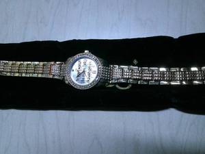 lot 103 image: BURGI LADIES CRYSTAL DIAMOND ACCENT AND MOTHER OF PEARL WATCH