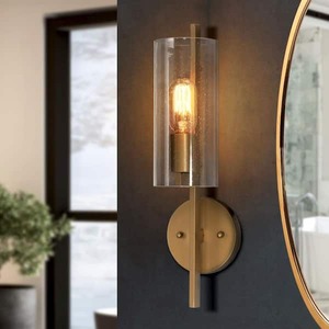 lot 181 image: Uolfin 17 in H. Modern Cylinder Powder Room Wall Sconce 1-Light Large Brass Gold Bathroom Single Light with Seeded Glass Shade