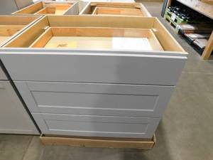 lot 210 image: Hampton Bay Shaker Dove Gray Stock Assembled Pots and Pans Drawer Base Kitchen Cabinet & 36 Wall Cabinet