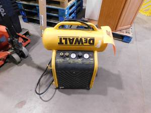 lot 242 image: DEWALT 4.5 Gal. Portable Electric Air Compressor
