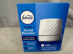 lot 24 image: New Febreeze Plug Scent Booster Oil Warmer