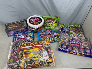 lot 71 image: Assorted Candy, Dubble Bubble, Crybaby Sour Mix, Dots, Fruit Chews, Tootsie Rolls, and More.