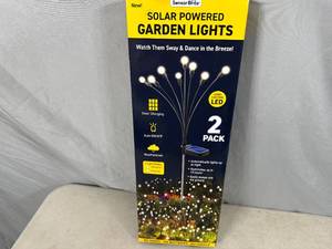 lot 77 image: New 2 Pack of Solar Powered Garden Lights